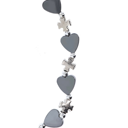 Bracciale elastico cuoricini in Ematite e crocette in metallo