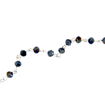 Bracciale decina con grani in simil cristallo nero