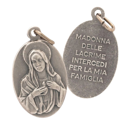Medaglia Madonna delle Lacrime, in ottone. Altezza 2 cm