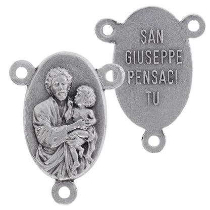Crociera san Giuseppe in ottone argentato. Altezza 2,2 cm