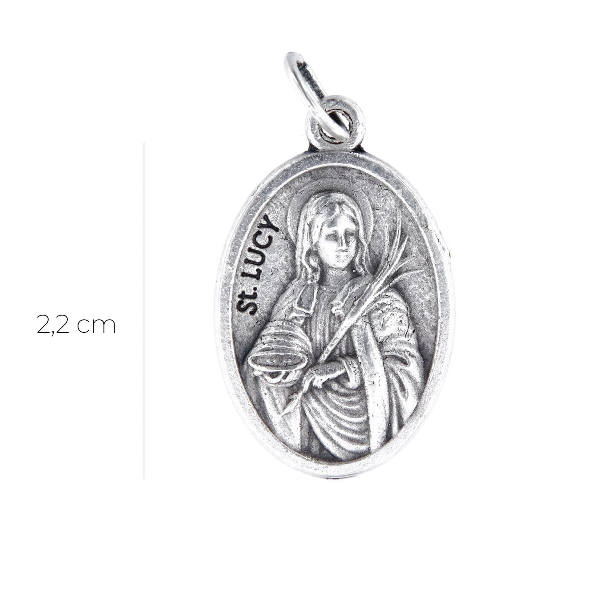 Medaglia Santa Lucia e retro croce, in zama. Altezza 2,2 cm