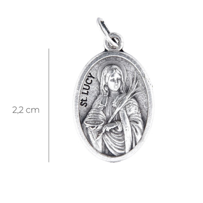 Medaglia Santa Lucia e retro croce, in zama. Altezza 2,2 cm