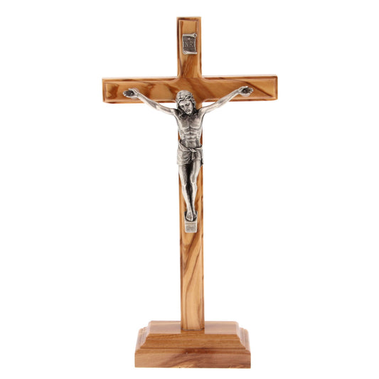 Crocifisso in legno d'ulivo e corpo in metallo con base. Altezza 23 cm
