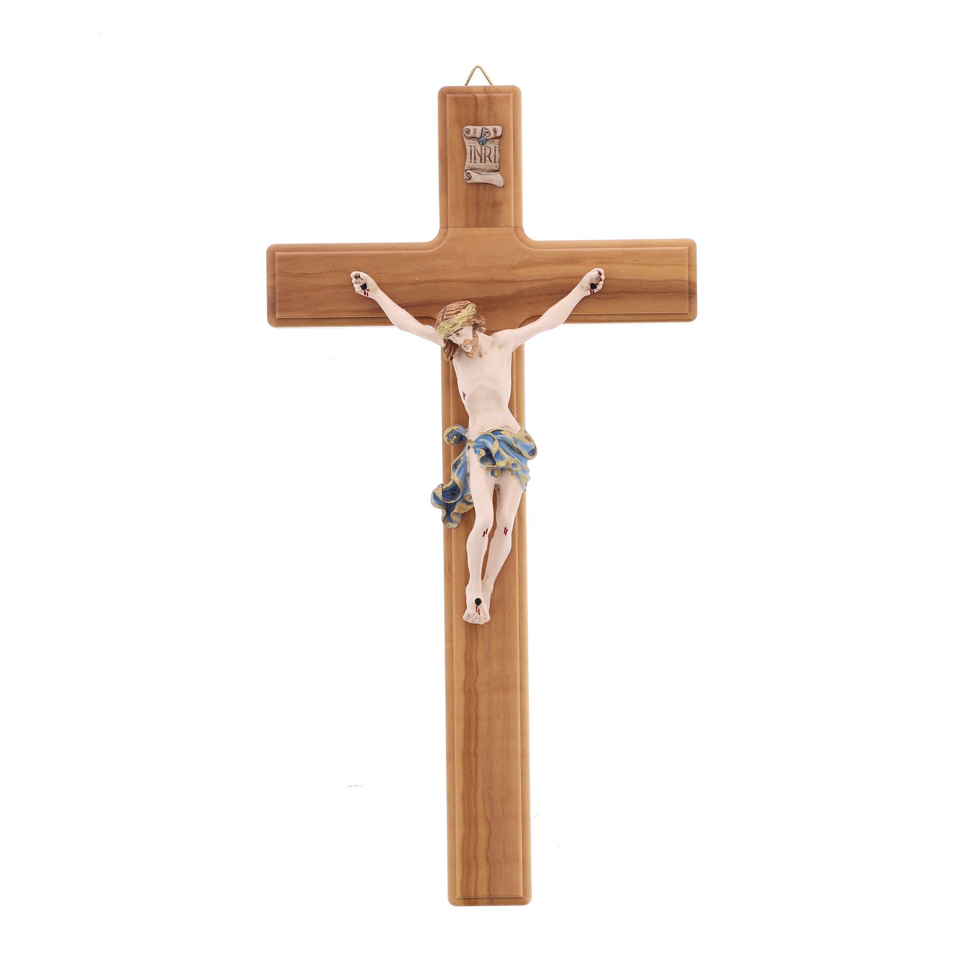 Crocifisso in legno d'olivo, corpo in resina decorata. Altezza 27 cm