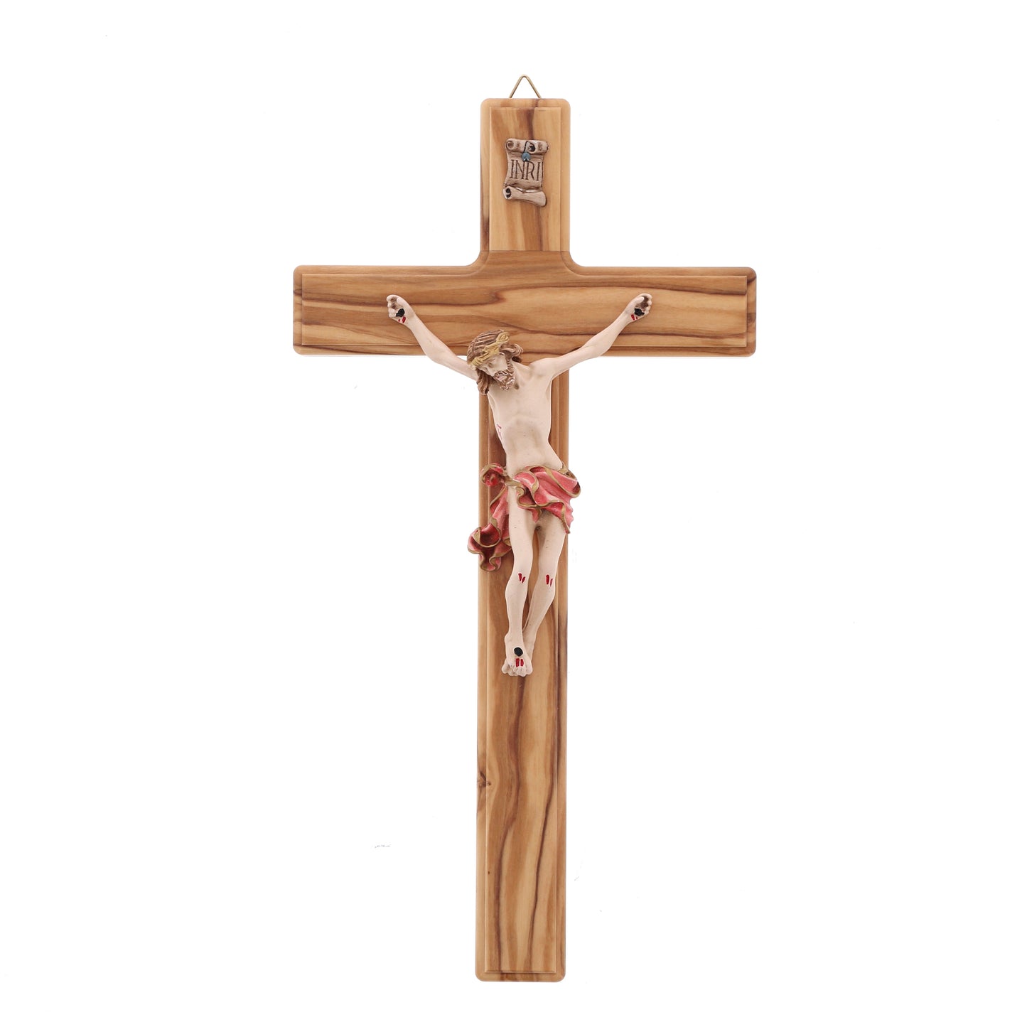 Crocifisso in legno d'olivo, corpo in resina decorata. Altezza 27 cm