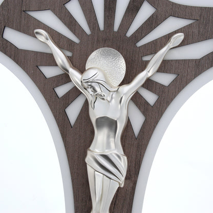 Crocifisso moderno in legno e corpo in resina argentata. Altezza 52 cm