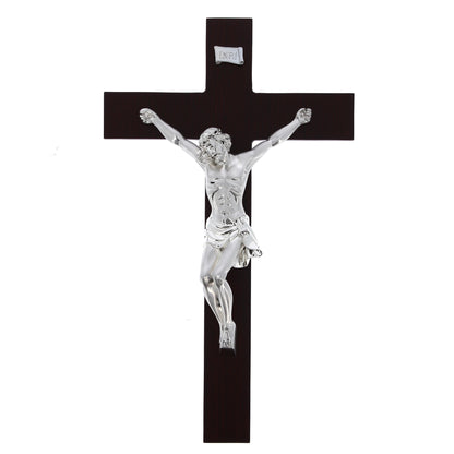 Crocifisso in legno e corpo in resina argentata. Altezza 46 cm