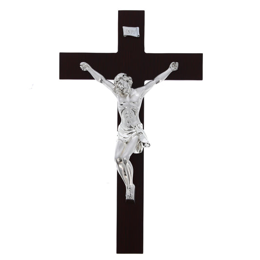 Crocifisso in legno e corpo in resina argentata. Altezza 46 cm