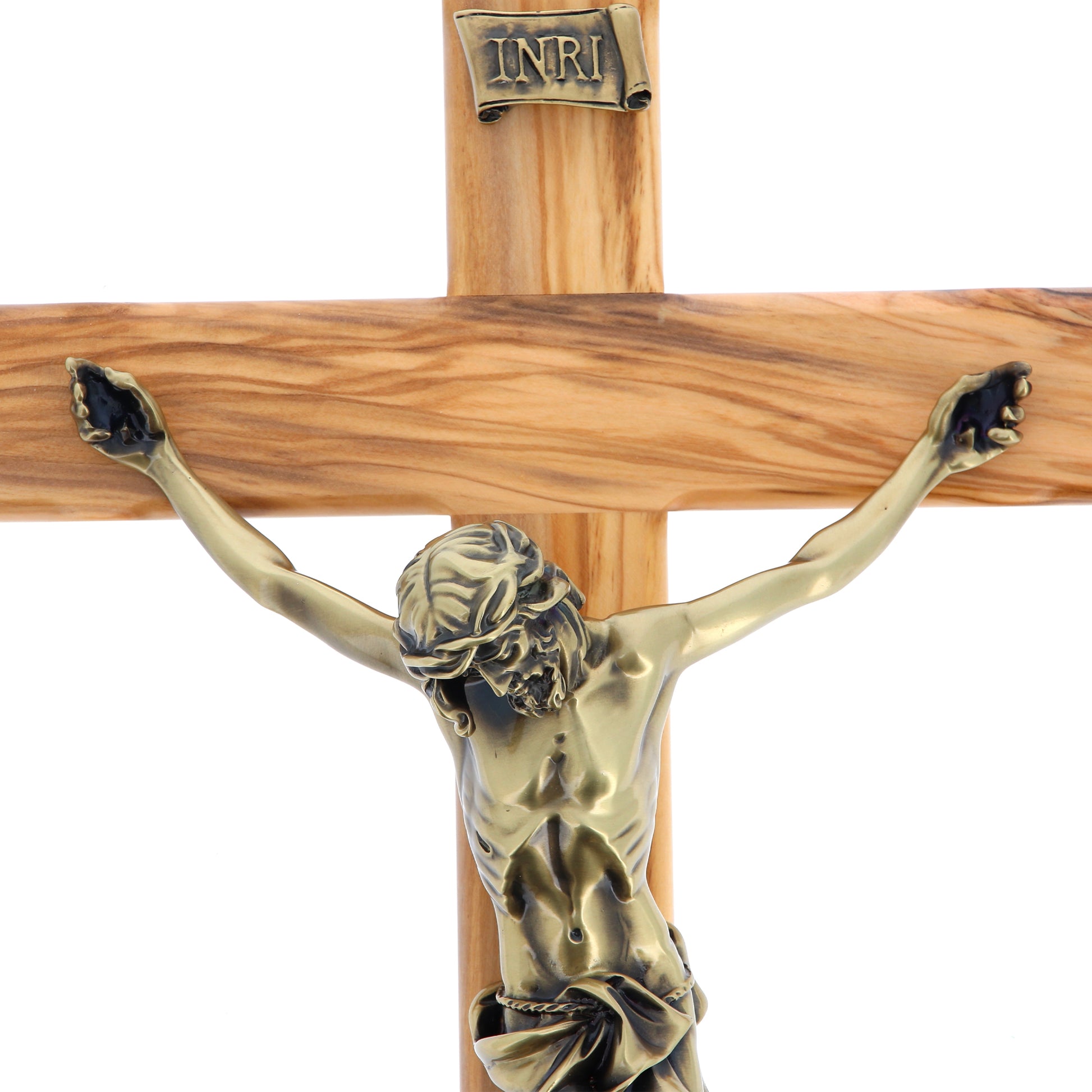 Crocifisso in legno d'olivo e corpo in resina bronzata. Altezza 48 cm