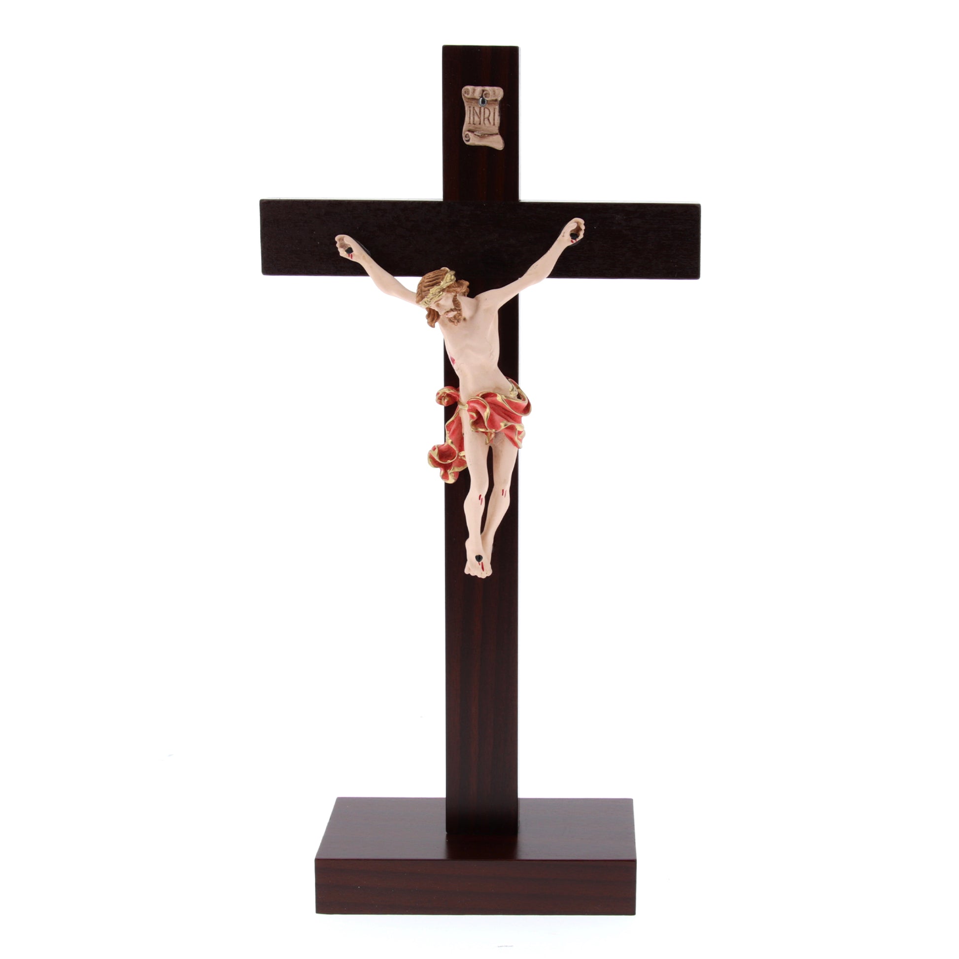 Crocifisso in legno massello e corpo in resina decorato con base. Altezza  29 cm