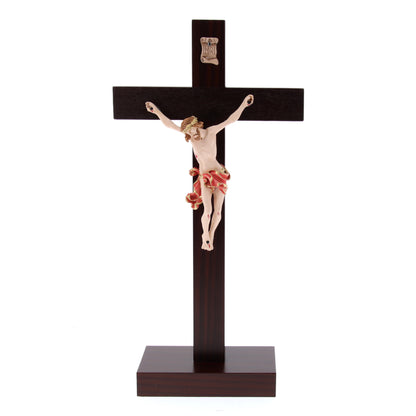 Crocifisso in legno massello e corpo in resina decorato con base. Altezza  29 cm