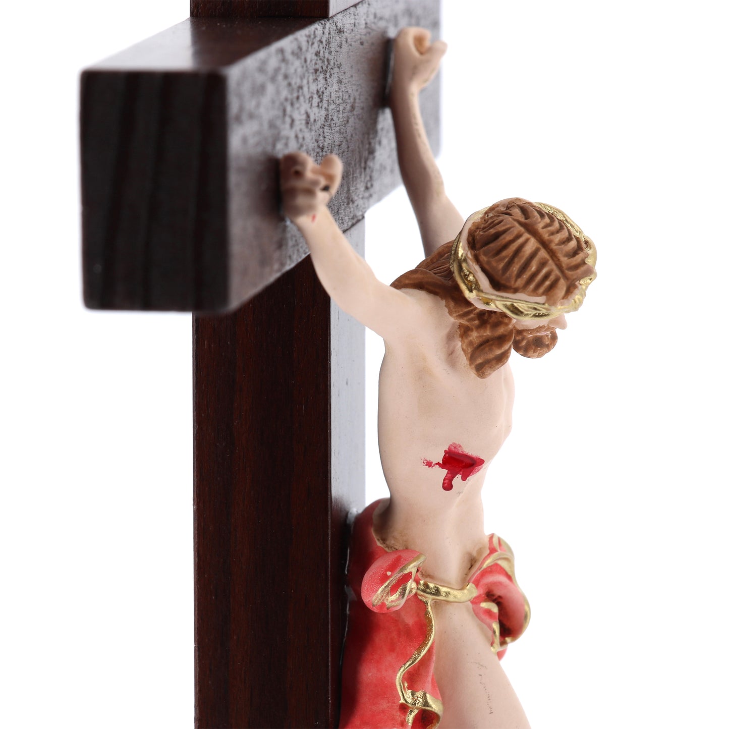 Crocifisso in legno massello e corpo in resina decorato con base. Altezza  29 cm