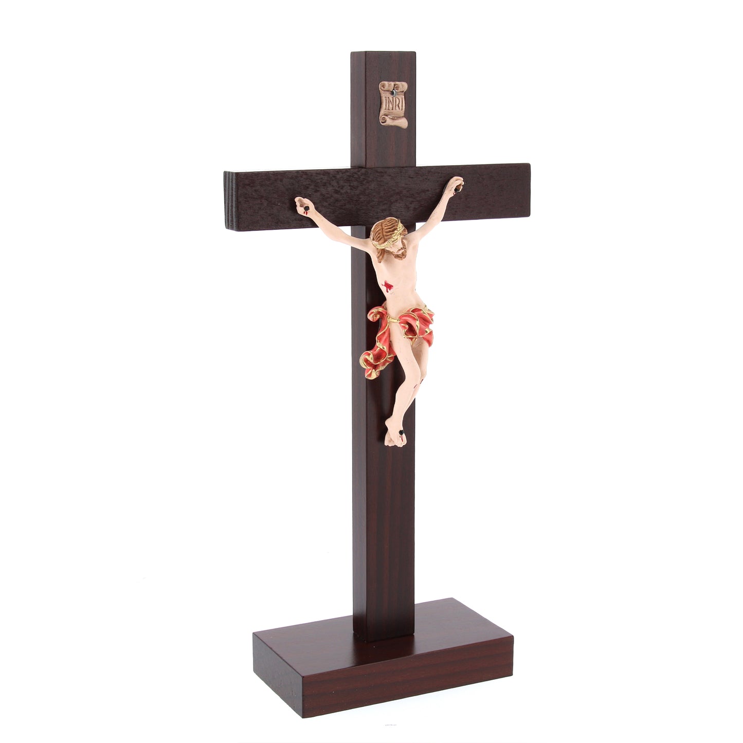 Crocifisso in legno massello e corpo in resina decorato con base. Altezza  29 cm
