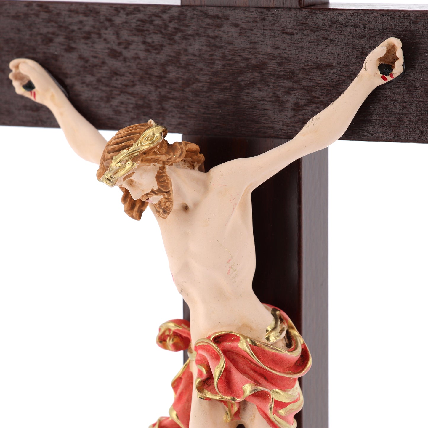 Crocifisso in legno massello e corpo in resina decorato con base. Altezza  29 cm