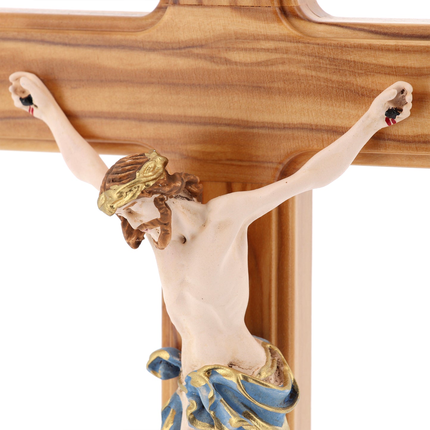 Crocifisso in legno d'olivo e corpo in resina decorato con base. Altezza  29 cm