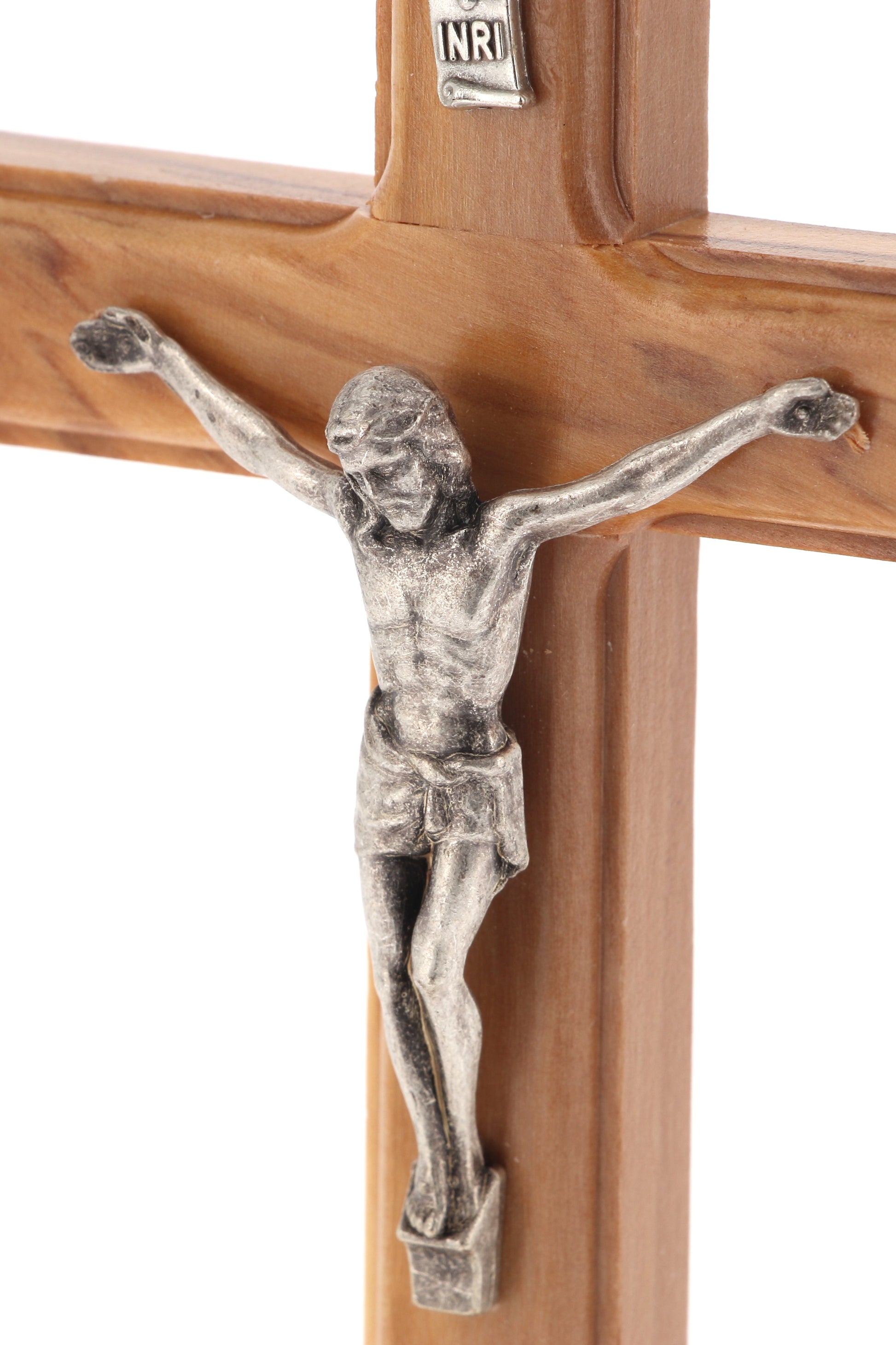 Crocifisso in legno d'ulivo e corpo in metallo con base. Altezza 14 cm
