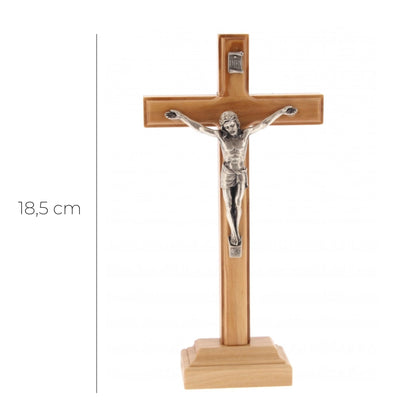 Crocifisso in legno d'ulivo e corpo in metallo con base. Altezza 18,5 cm
