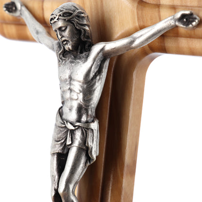 Crocifisso in legno d'ulivo e corpo in metallo. Altezza 15 cm
