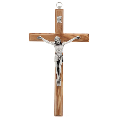 Crocifisso in legno d'ulivo e corpo in metallo. Altezza 12 cm