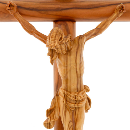 Crocifisso tondo con Corpo di Cristo in legno d'ulivo nazionale. Dimensioni 33X17 cm