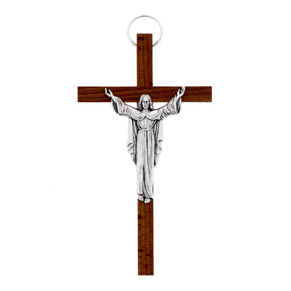 Crocifisso in legno con corpo in metallo Cristo Risorto. Dimensioni 13x7 cm
