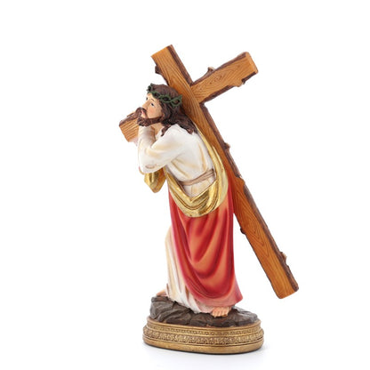 Statua Gesù che porta la Croce in resina colorata. Altezza 20 cm