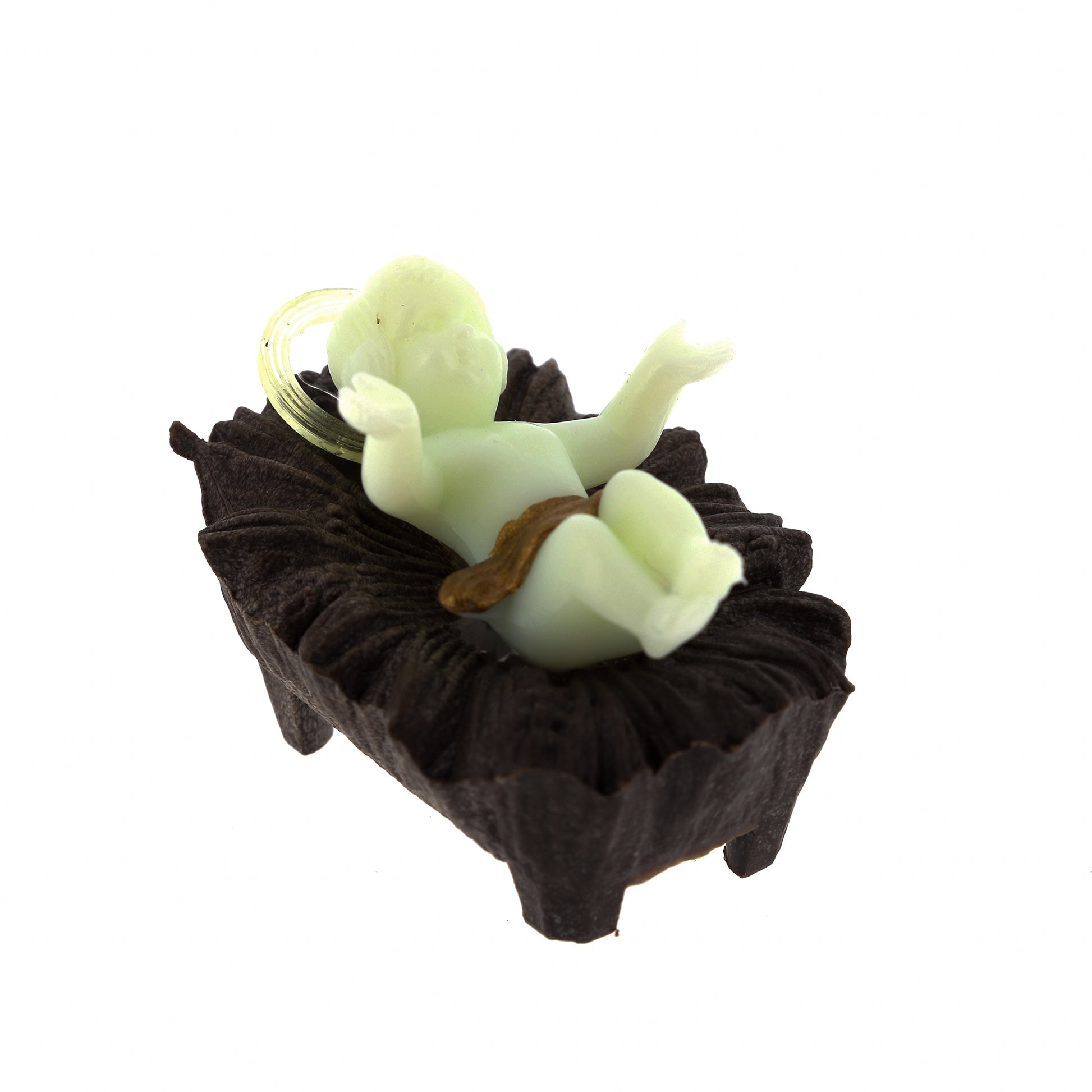 Gesù Bambino in plastica su mangiatoia. Dimensioni 3x4,5 cm
