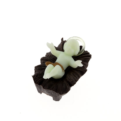 Gesù Bambino in plastica su mangiatoia. Dimensioni 3x4,5 cm