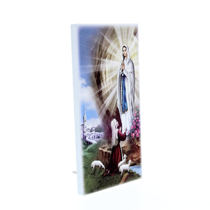 Quadro in legno Madonna di Lourdes con dettagli argentati. Dimensione 9x18 cm
