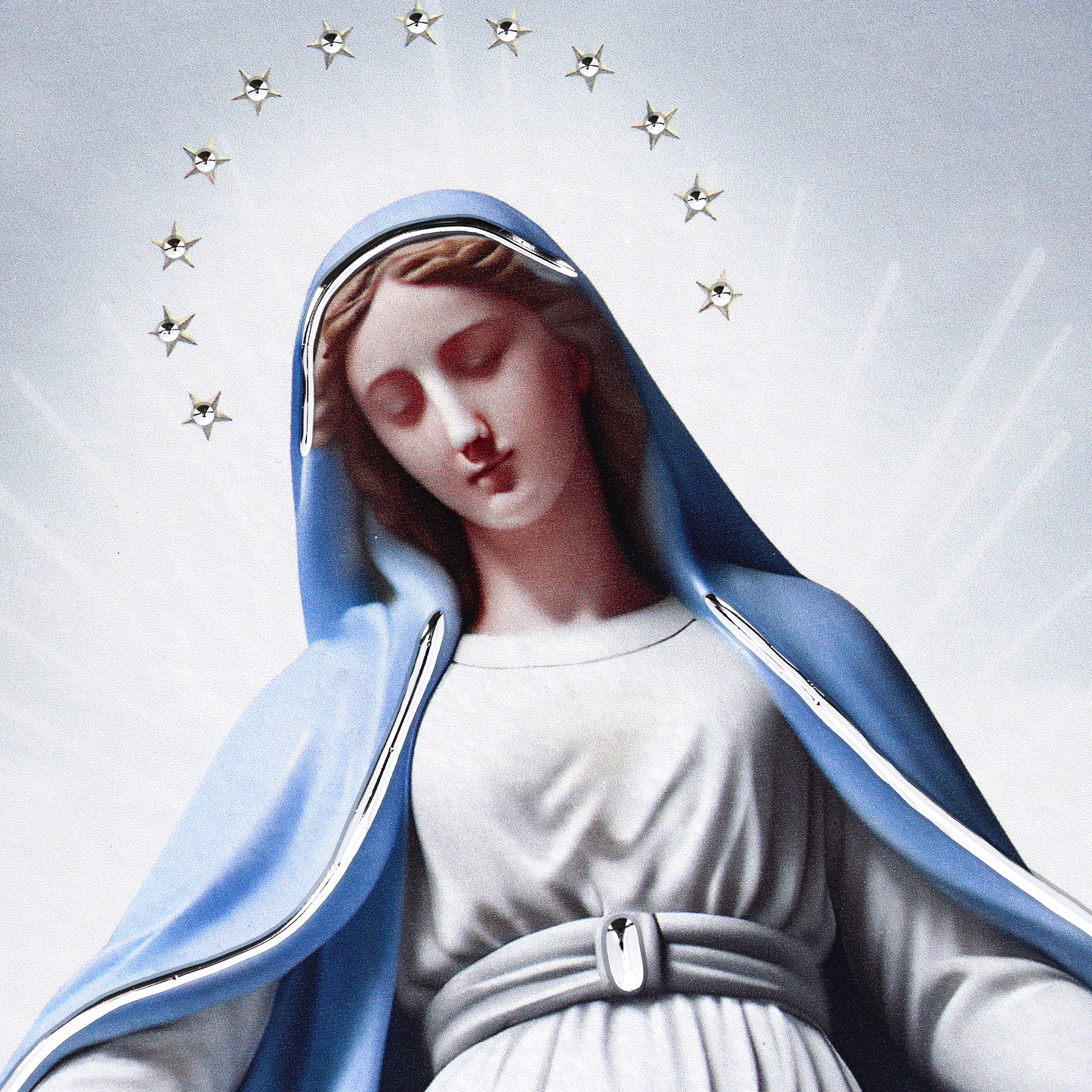 Quadro in legno Madonna con dettagli argentati. Dimensione 18x36 cm