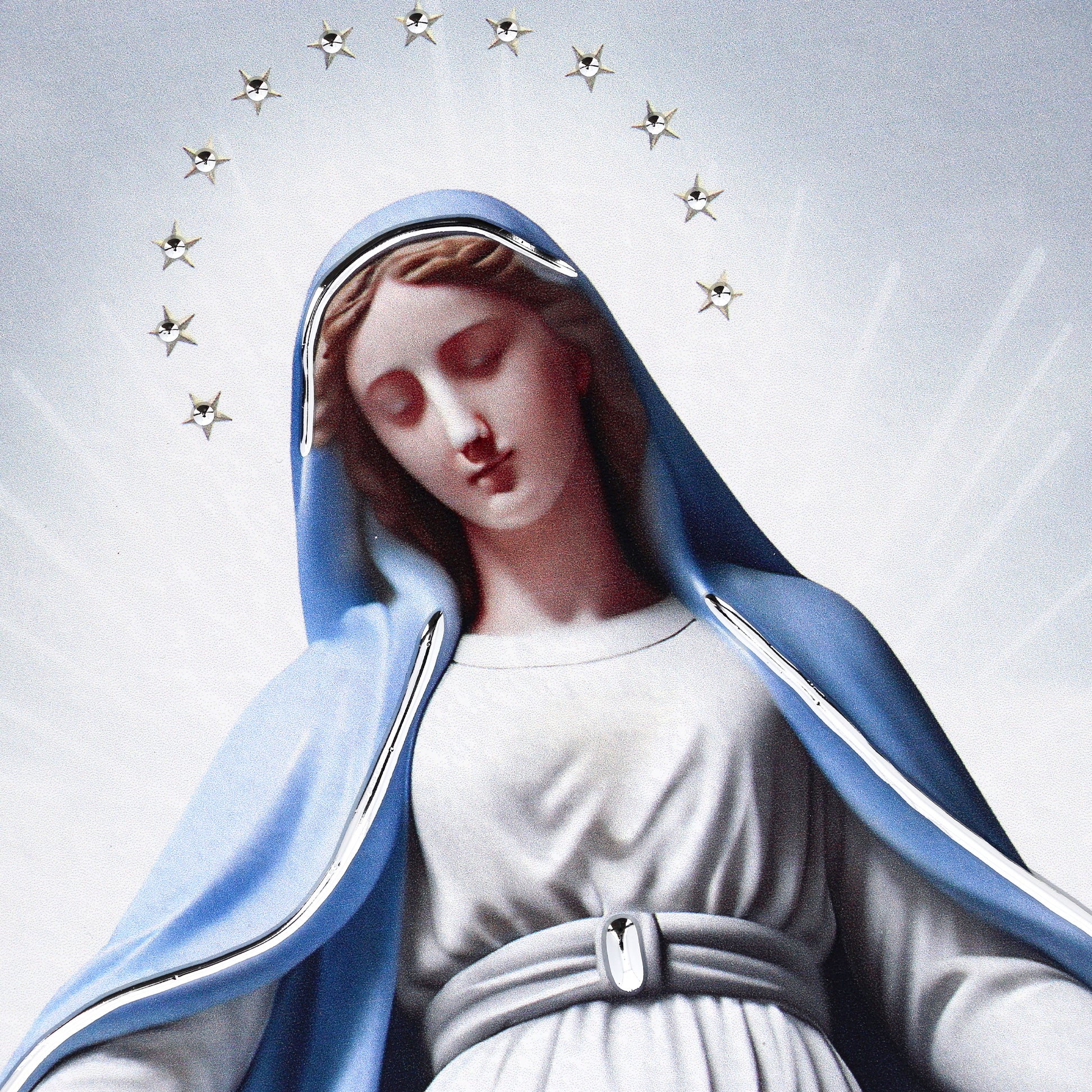 Quadro in legno Madonna con dettagli argentati. Dimensione 18x36 cm