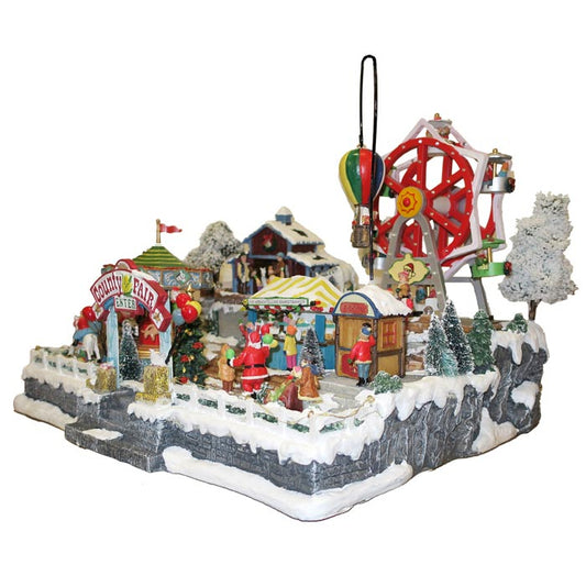 Villaggio Natalizio "Fiera paesana" animato da luci, suoni e movimenti. Dimensioni 36x44x40 cm
