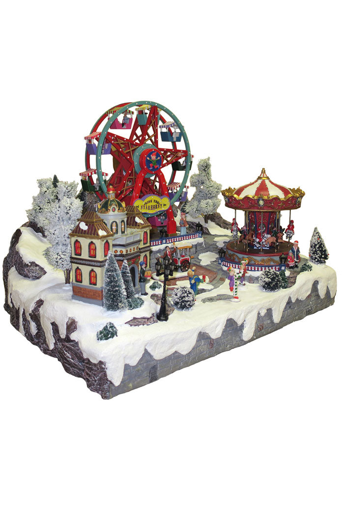 Villaggio Natalizio "Giostra e ruota panoramica" animato da luci, suoni e movimenti. Dimensioni 45x59x35 cm