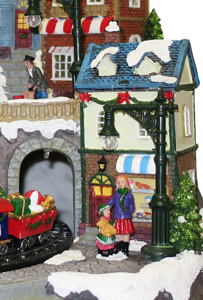 Villaggio Natalizio "Stazione e Negozi" animato da luci, suoni e movimenti. Dimensioni 38x41x35 cm