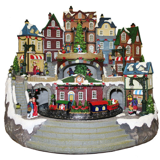 Villaggio Natalizio "Stazione e Negozi" animato da luci, suoni e movimenti. Dimensioni 38x41x35 cm