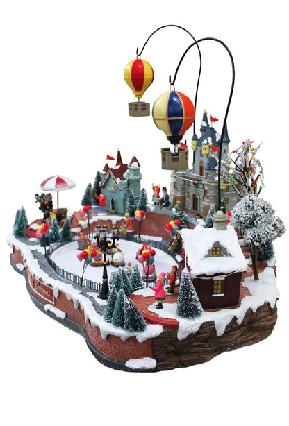 Villaggio Natalizio "Mongolfiere in volo" animato da luci, suoni e movimenti. Dimensioni 45x62x44 cm
