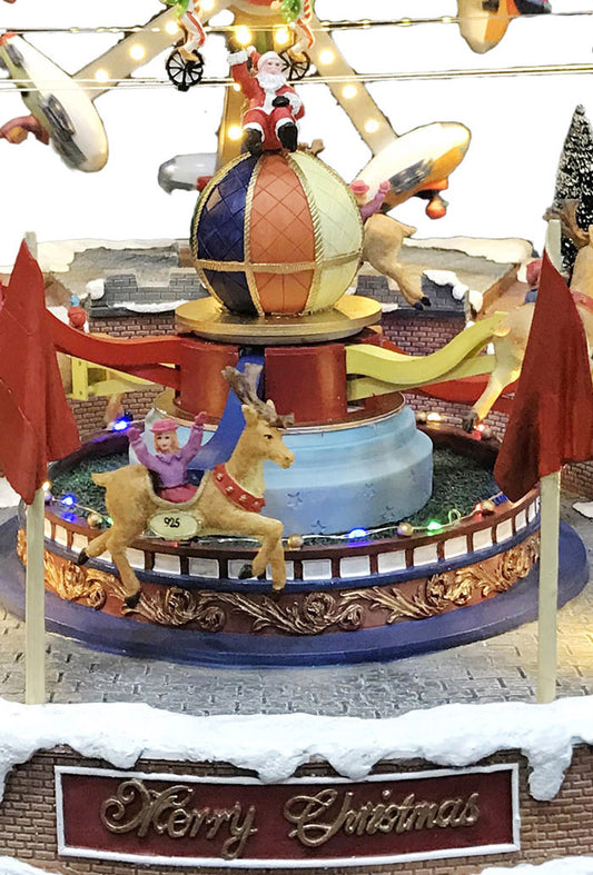 Villaggio Natalizio "Luna Park" animato da luci, suoni e movimenti. Dimensioni 41x68x46 cm