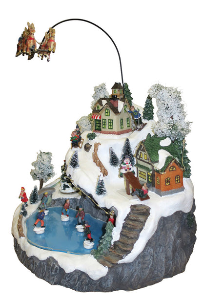 Villaggio Natalizio "Lago ghiacciato" animato da luci, suoni e movimenti. Dimensioni 35x35x40 cm