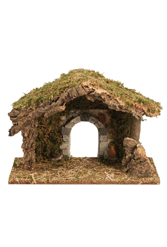 Capanna in legno con arco in gesso. Dimensioni 36x24x15 cm.