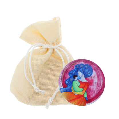 Calamita in ceramica, "Mamma con bambino". Diametro 6,8 cm