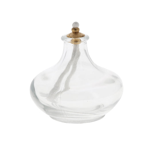 Lume a cera liquida, in vetro. Dimensioni 7x7 cm.