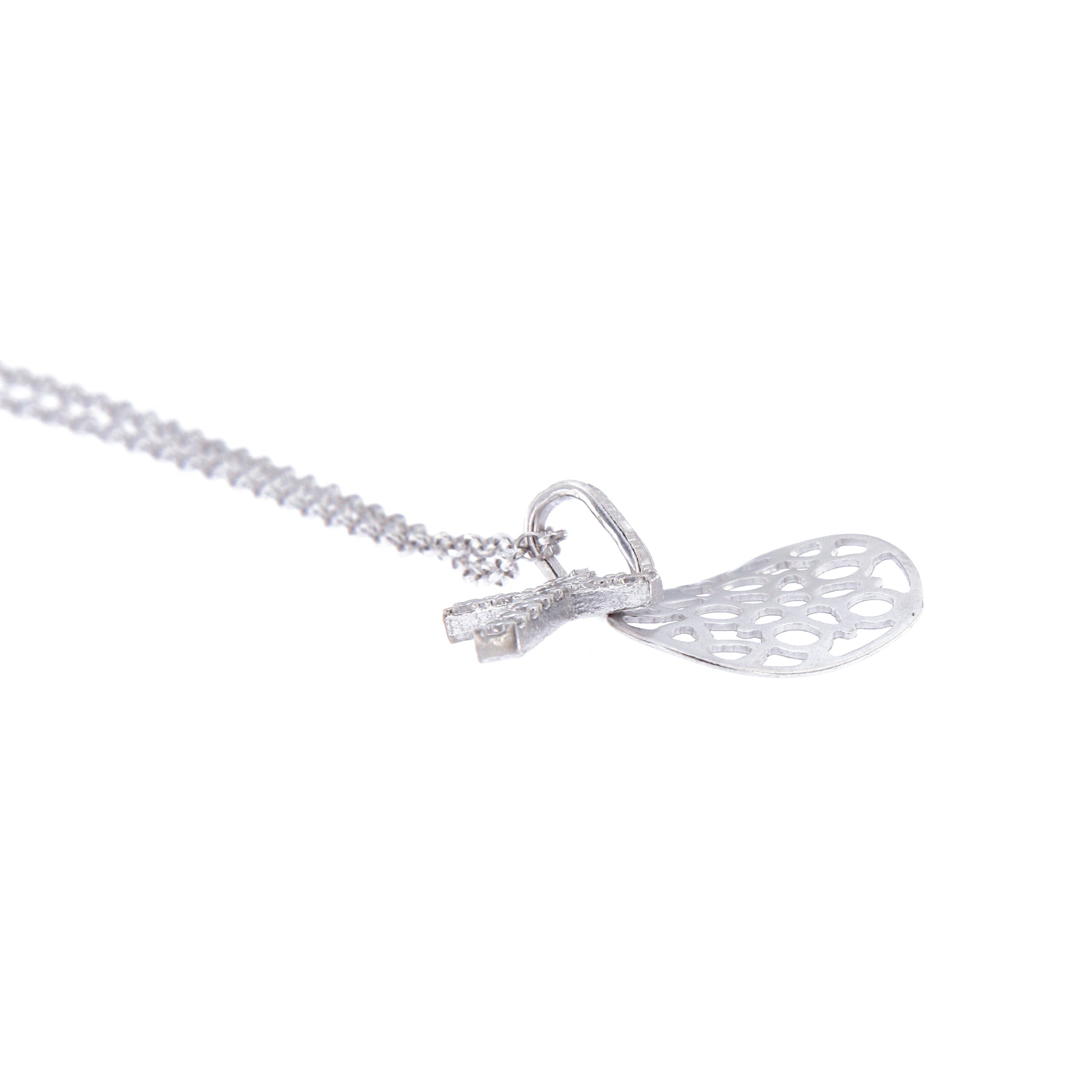 Collana croce con zirconi e cuore traforato in argento 925 rodiato. Lunghezza cm. 42+3