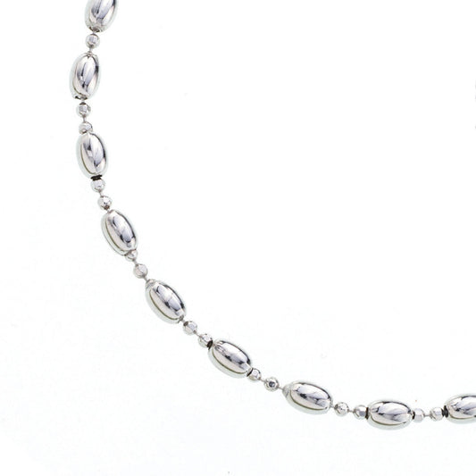 Bracciale decina maglia pallinata e grani ovali  in argento 925 rodiato. Llunghezza 17+ 3 cm