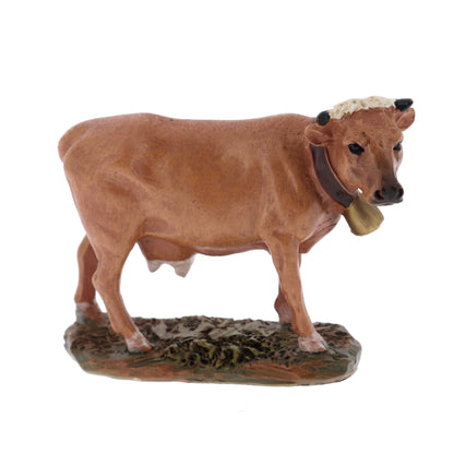 Mucca in resina. Altezza 8 cm