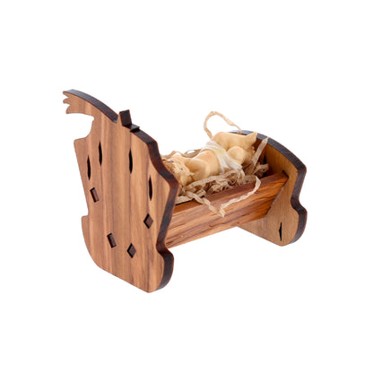 Culla in legno d'olivo con Gesù Bambino. Dimensioni 5,5x6 cm