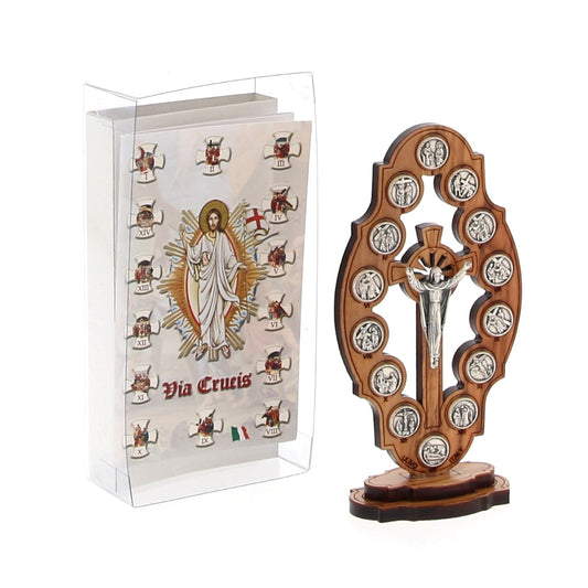Via Crucis in legno d'olivo sagomato e colorato con stazioni in metallo e base. Dimensioni 7x13,5 cm