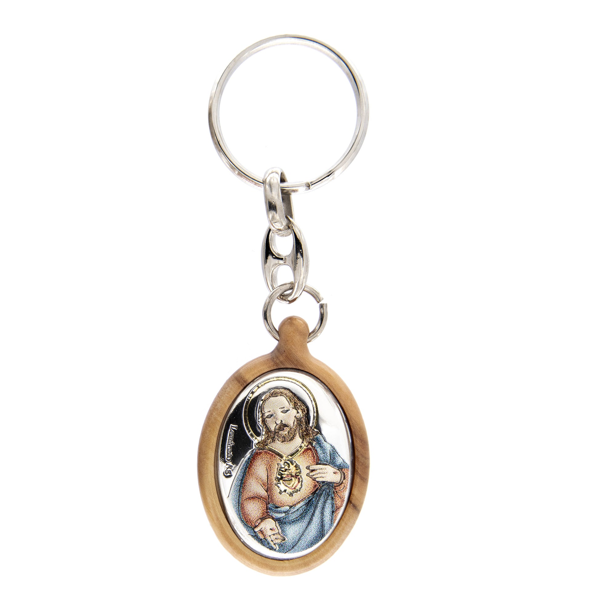 Portachiavi in legno d'olivo con placca in argento laminato colorata. Dimensioni 4,2x2,8 cm