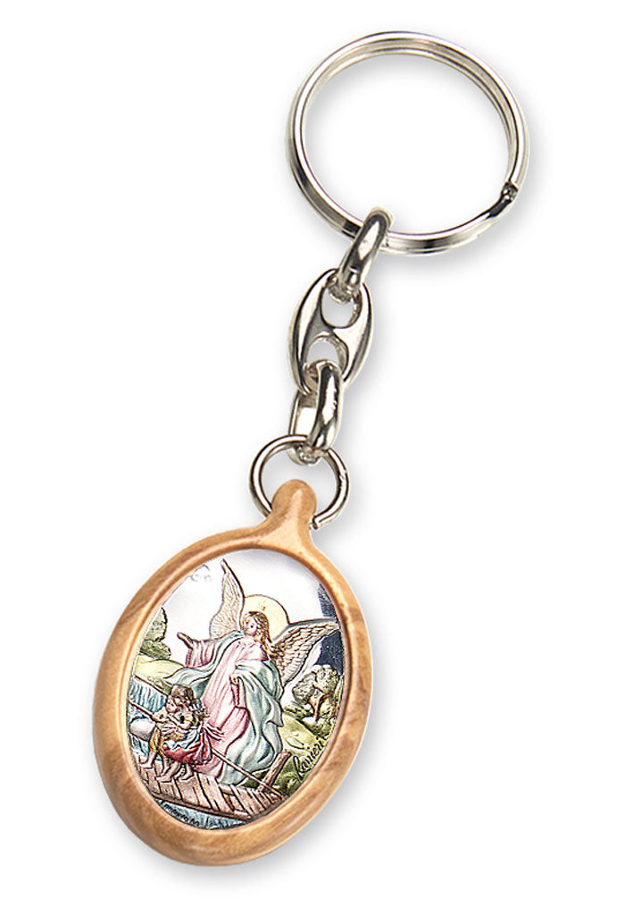 Portachiavi in legno d'olivo con placca in argento laminato colorata. Dimensioni 4,2x2,8 cm