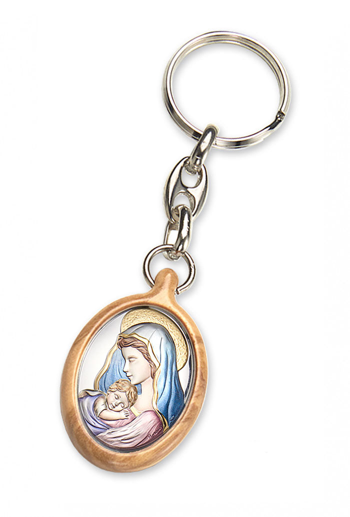 Portachiavi in legno d'olivo con placca in argento laminato colorata. Dimensioni 4,2x2,8 cm
