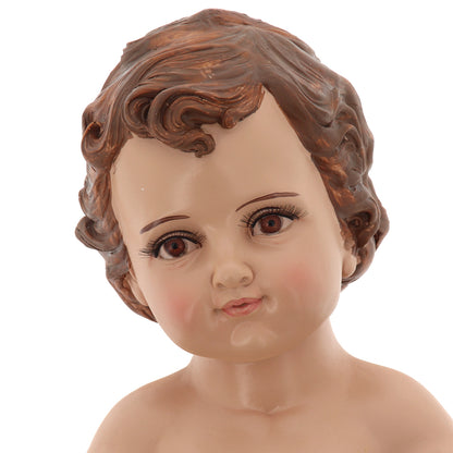 Statua Gesù Bambino in resina, con occhi in vetro. Altezza 43 cm